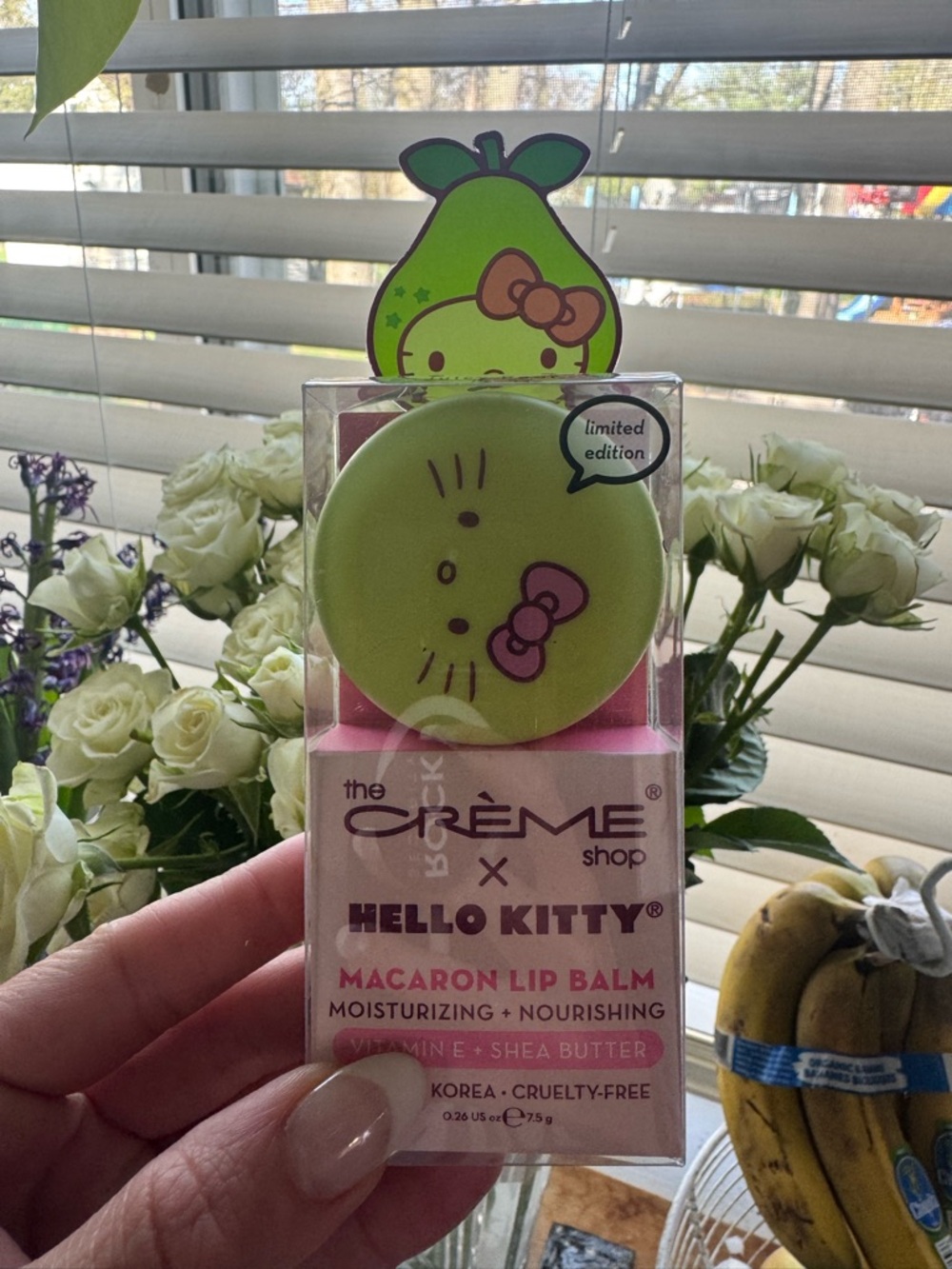 The Crème Shop x Hello Kitty Macaron Lip Balm in Juicy Pear